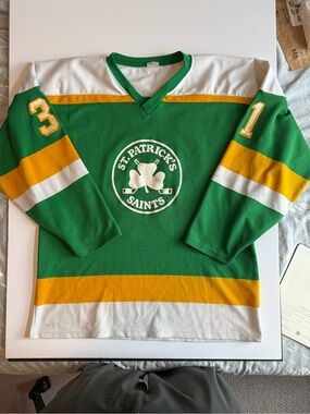 St. Patrick's Saints Green Hockey Jersey with Gold & White Stripes